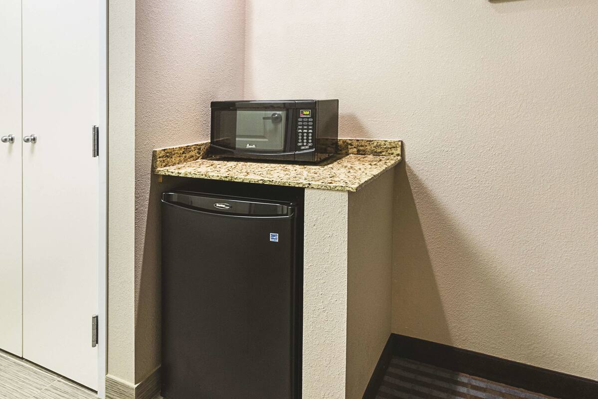 premium bedding, pillow-top beds, desk, blackout curtains