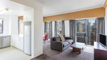 One Bedroom Deluxe Apartment - Riverside Tower  | Desk, blackout drapes, iron/ironing board, cribs/infant beds