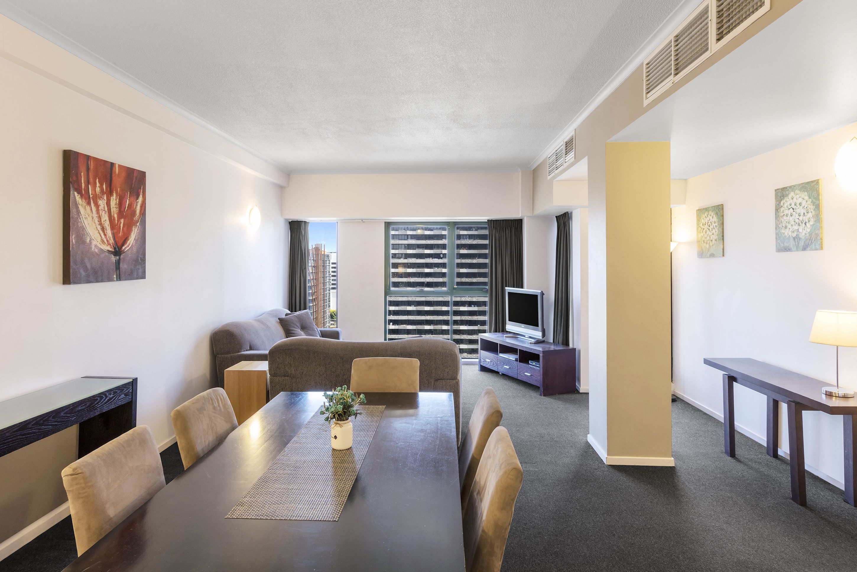 Two Bedroom Deluxe Apartment City View - Riverside Tower  | Desk, blackout drapes, iron/ironing board, cribs/infant beds
