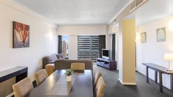 Two Bedroom Deluxe Apartment City View - Riverside Tower | Desk, blackout drapes, iron/ironing board, cribs/infant beds