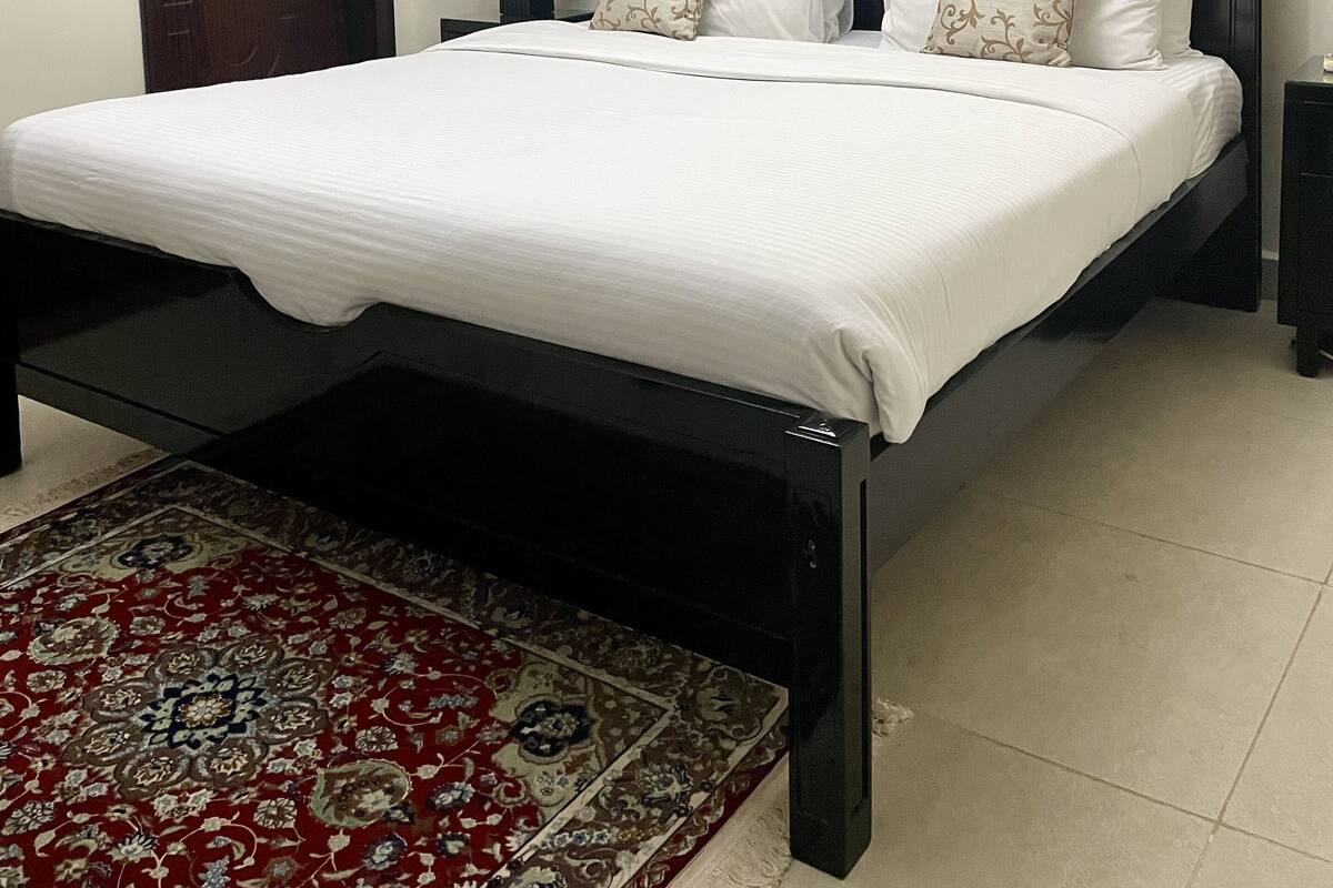 Deluxe Suite, 2 Bedrooms | Premium bedding, in-room safe, desk, laptop workspace