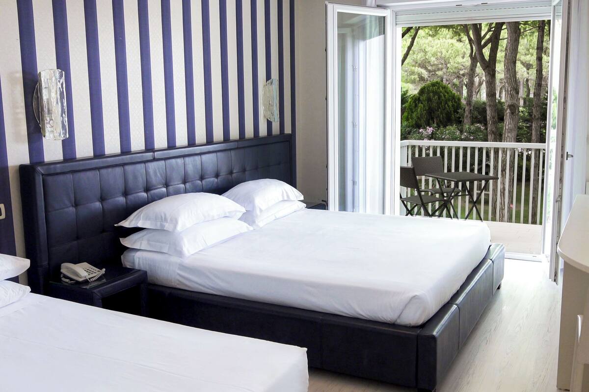 deluxe triple room (beach access included) | 1 bedroom, minibar, in-room safe, desk