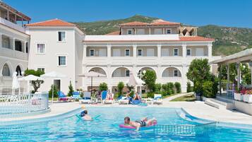 Outdoor pool, pool umbrellas, pool loungers