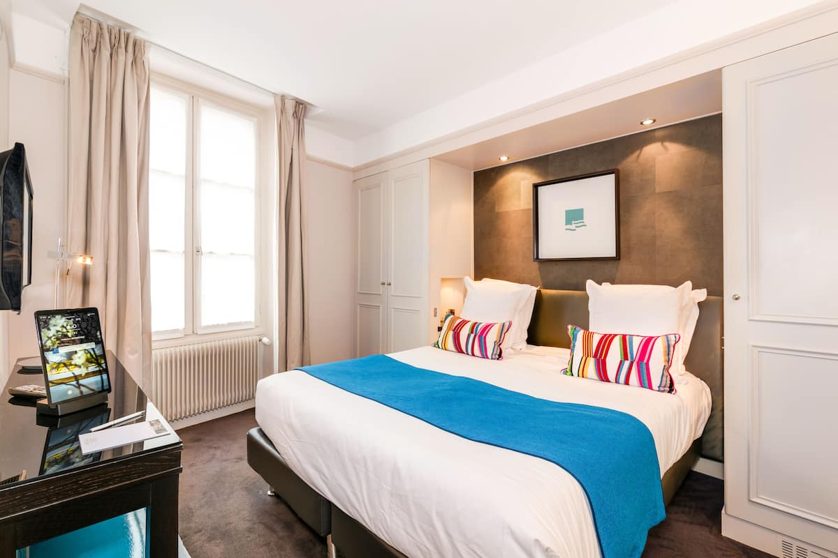 Een minibar, een kluis op de kamer, verduisterende gordijnen