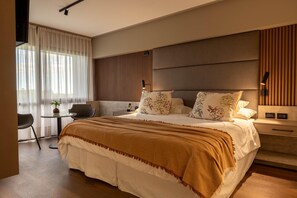 Hypo-allergenic bedding, minibar, in-room safe, individually decorated