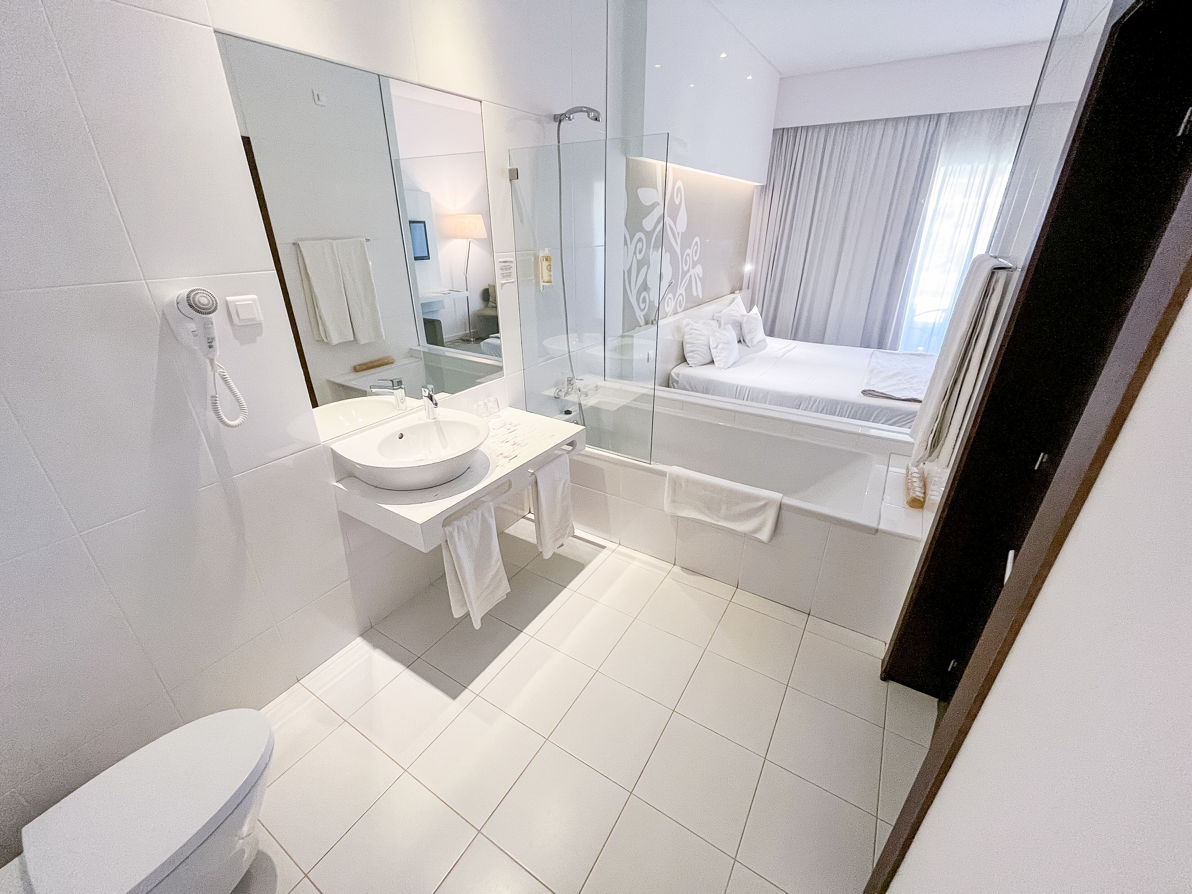 deep-soaking bathtub, free toiletries, hair dryer, bidet