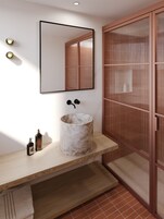 Shower, hair dryer, bidet, towels