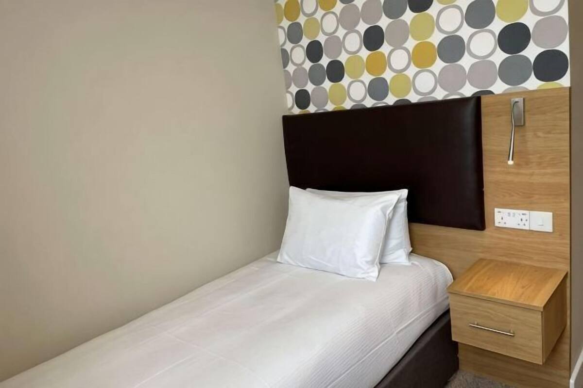 Desk, blackout drapes, iron/ironing board (on request), WiFi (free)