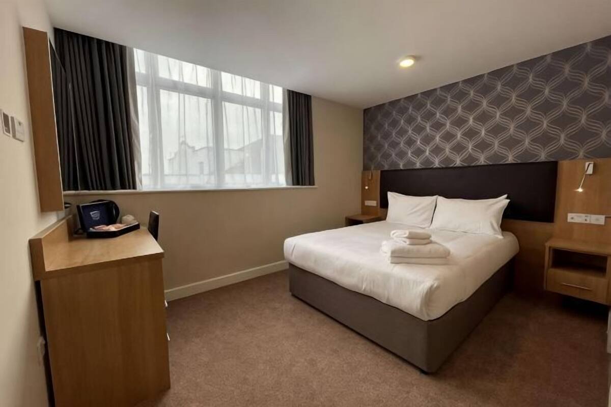 Desk, blackout drapes, iron/ironing board (on request), WiFi (free)