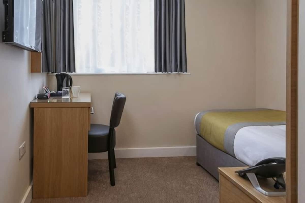 Desk, blackout drapes, iron/ironing board (on request), WiFi (free)