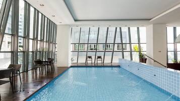 Indoor pool, outdoor pool, pool umbrellas, pool loungers