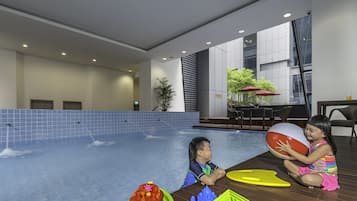 Indoor pool, outdoor pool, pool umbrellas, pool loungers