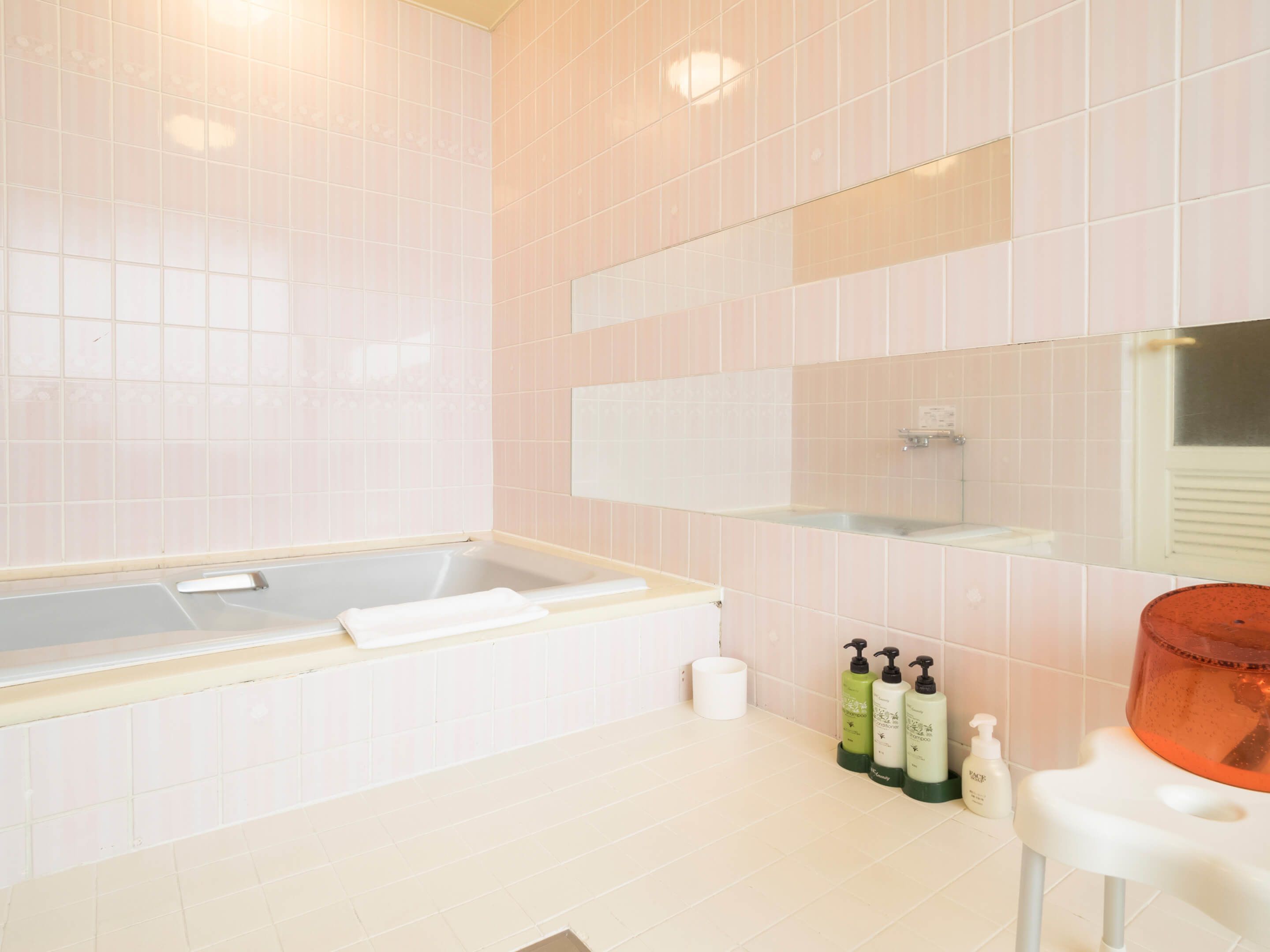 separate bathtub and shower, free toiletries, hair dryer, slippers