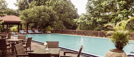 Outdoor pool, open 8:30 AM to 7:00 PM, pool loungers