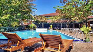 Outdoor pool, open 8:30 AM to 7:00 PM, pool loungers