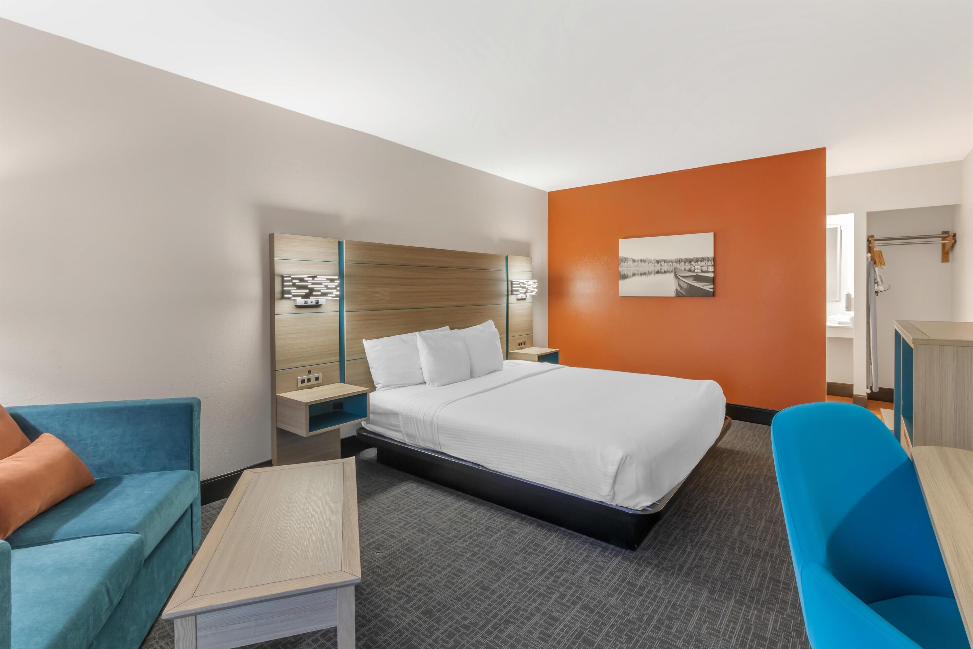 Chambre Standard, 1 très grand lit, accessible aux personnes à mobilité réduite | Bureau, rideaux occultants, fer et planche à repasser, Wi-Fi gratuit