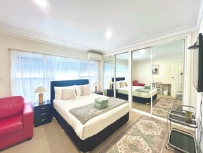Premium Triple Room, 1 Queen Bed, Shared Bathroom | Premium bedding, pillowtop beds, laptop workspace, iron/ironing board - North Ryde Guest House (North Ryde)