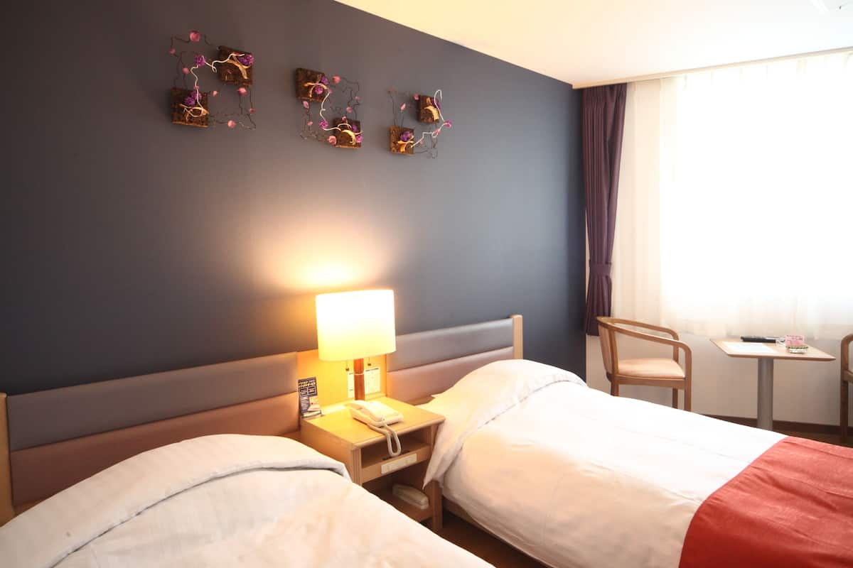 economy twin room, 2 single beds, non smoking | free wifi, bed sheets