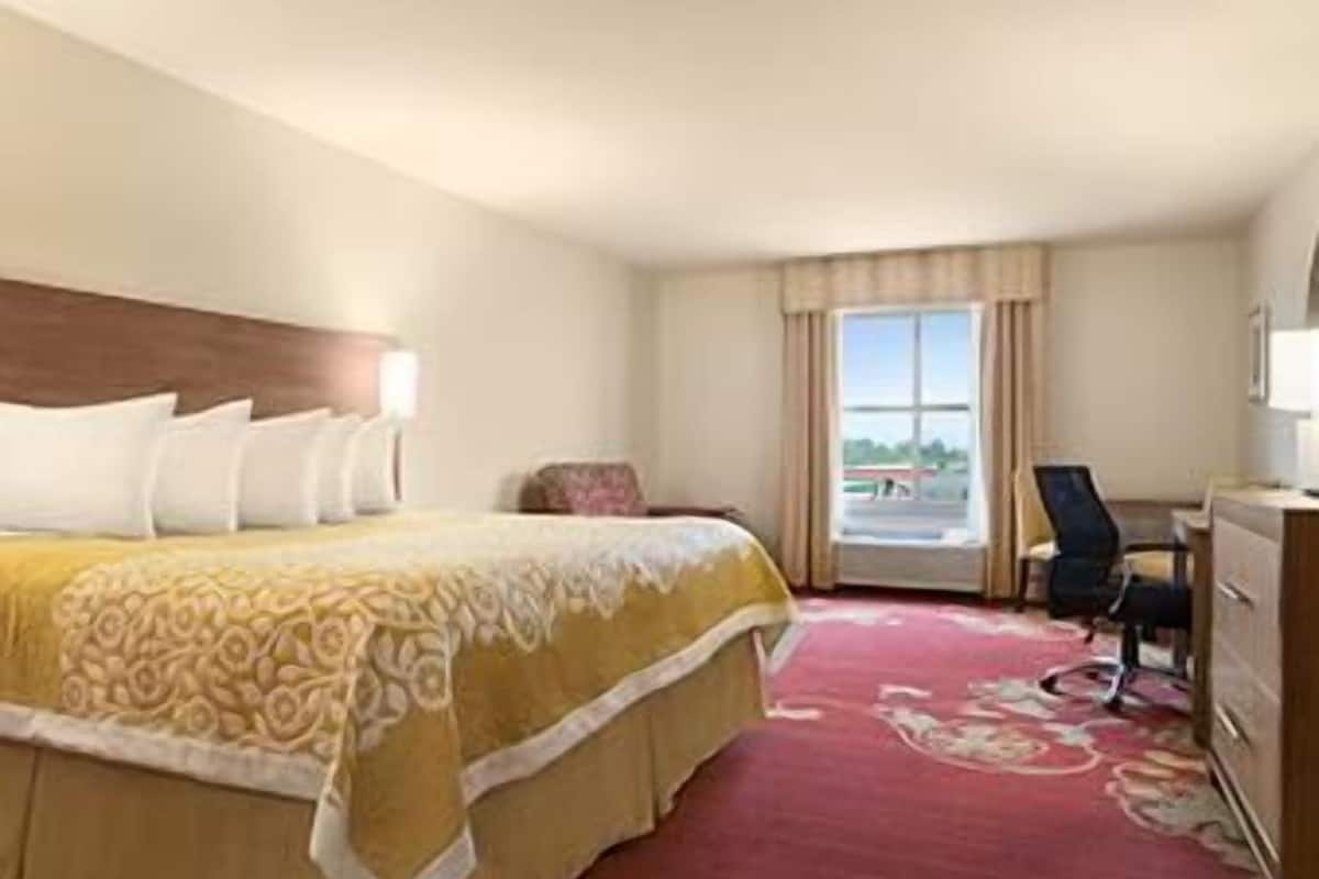 desk, laptop workspace, blackout curtains, iron/ironing board