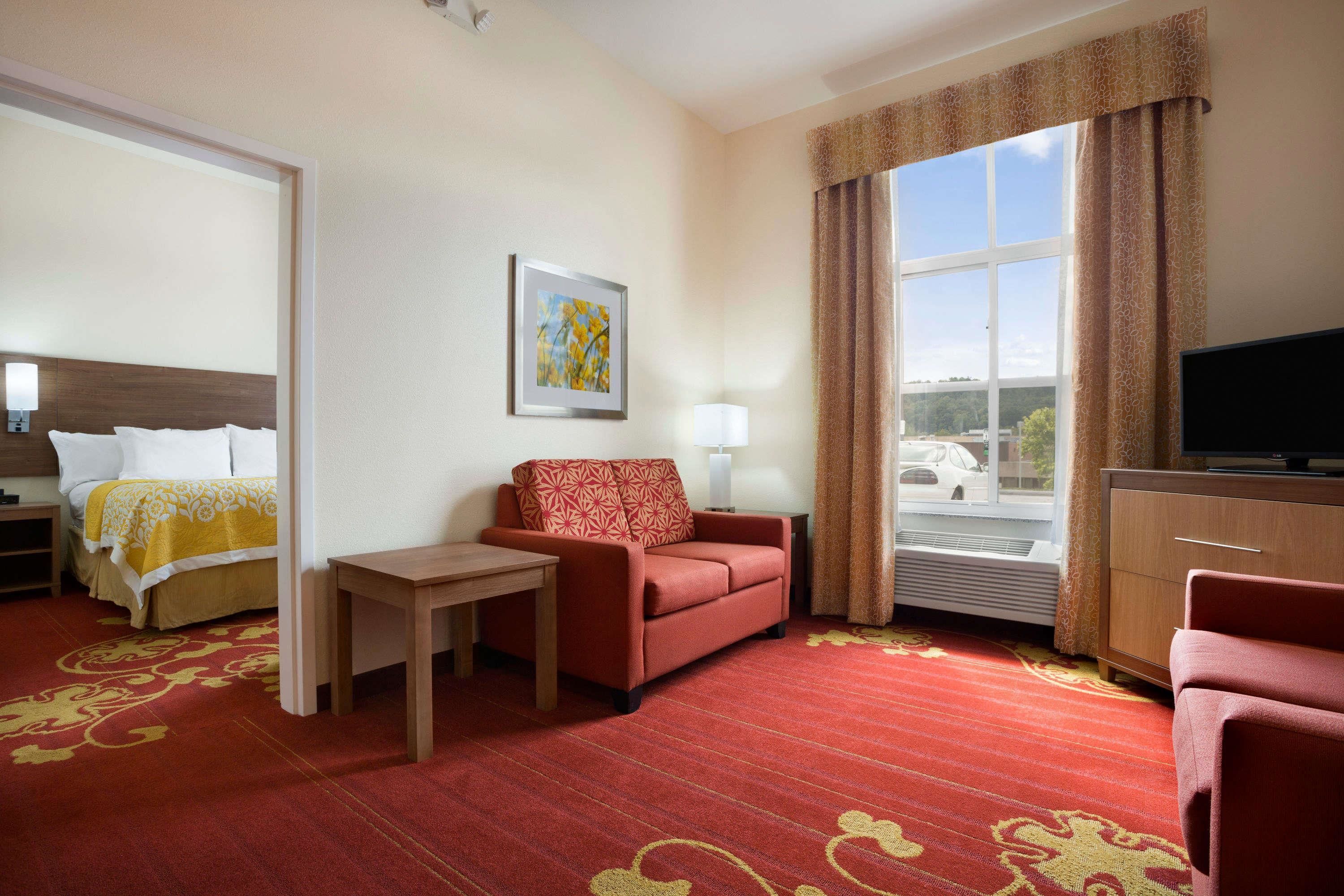 desk, laptop workspace, blackout curtains, iron/ironing board