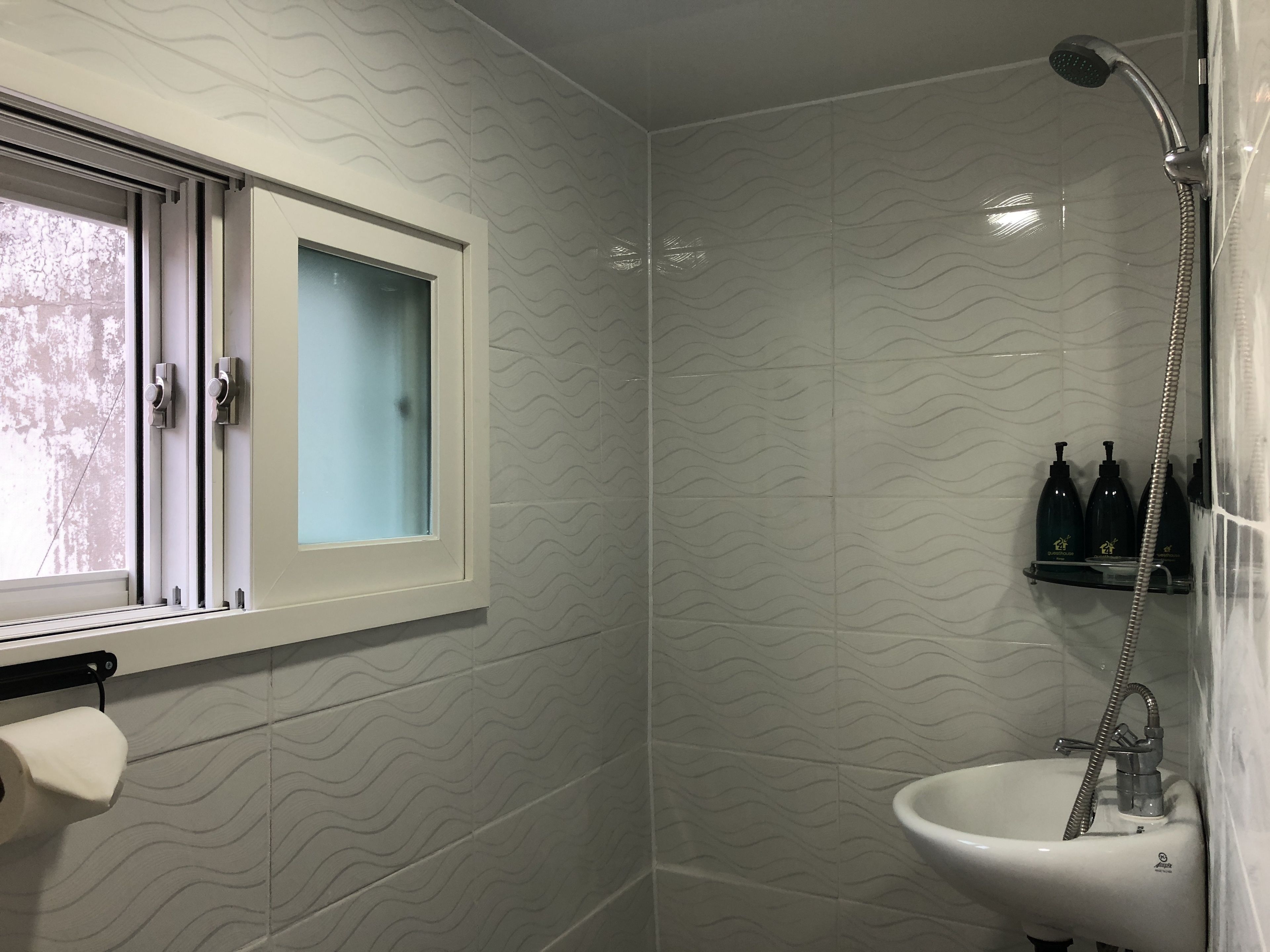 Triple Room (1 Bunk bed, 1 Slide bed) | Bathroom | Shower, free toiletries, hair dryer, slippers