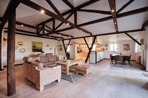 Penthouse Suite | Living area | Flat-screen TV, DVD player, foosball, toys - Askegaarden Apartments (Sandved)