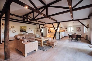 Penthouse Suite | Living area | Flat-screen TV, DVD player, foosball, toys