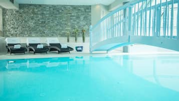 Indoor pool, open 10 AM to 10 PM, pool loungers