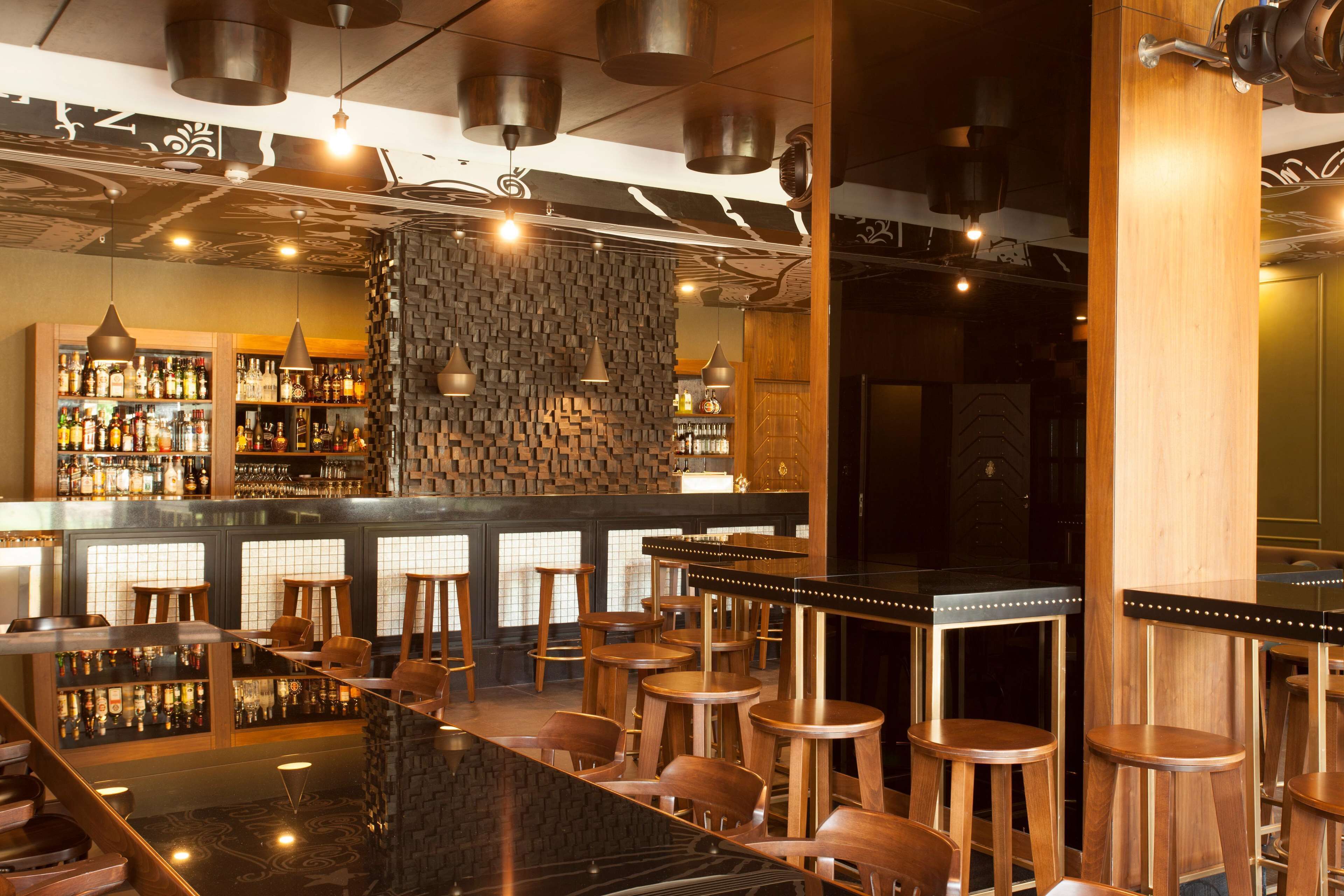 5 bars/lounges, poolside bar, beach bar