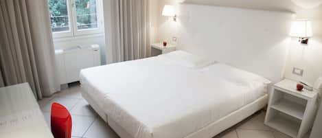 Ropa de cama de alta calidad y minibar
