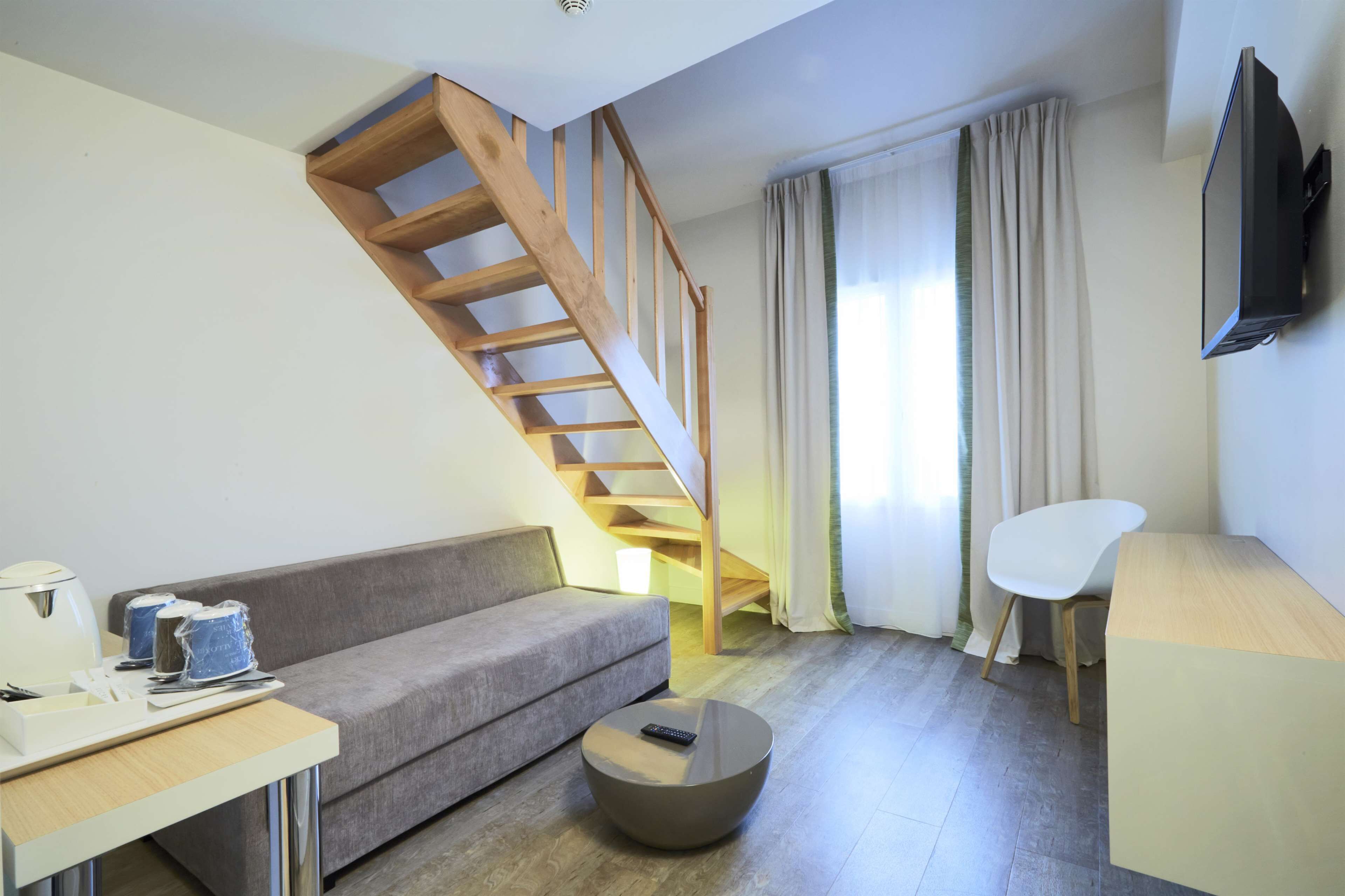 superior room, multiple beds | in-room safe, soundproofing, iron/ironing board, cots/infant beds