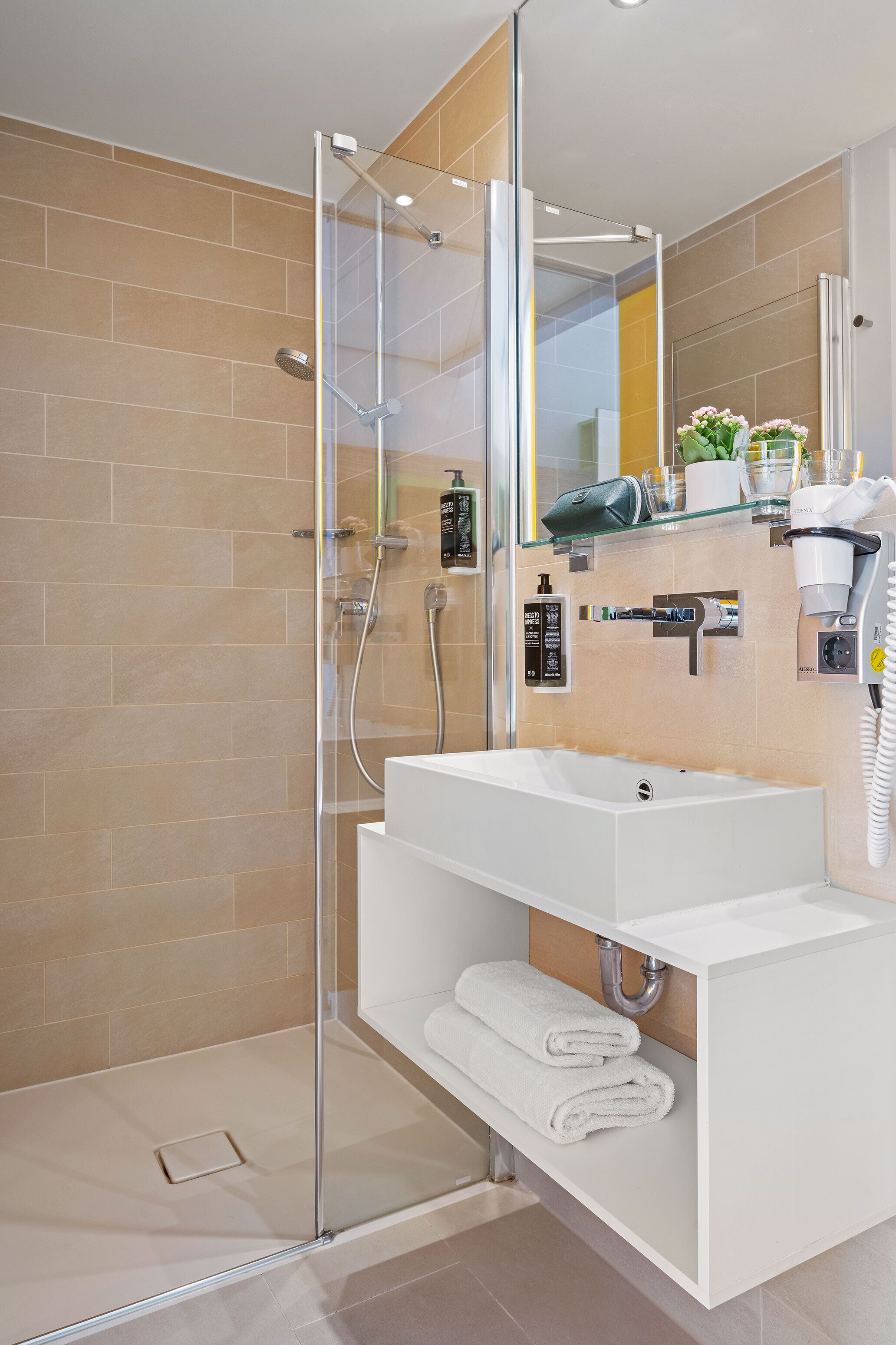 shower, eco-friendly toiletries, hair dryer, towels