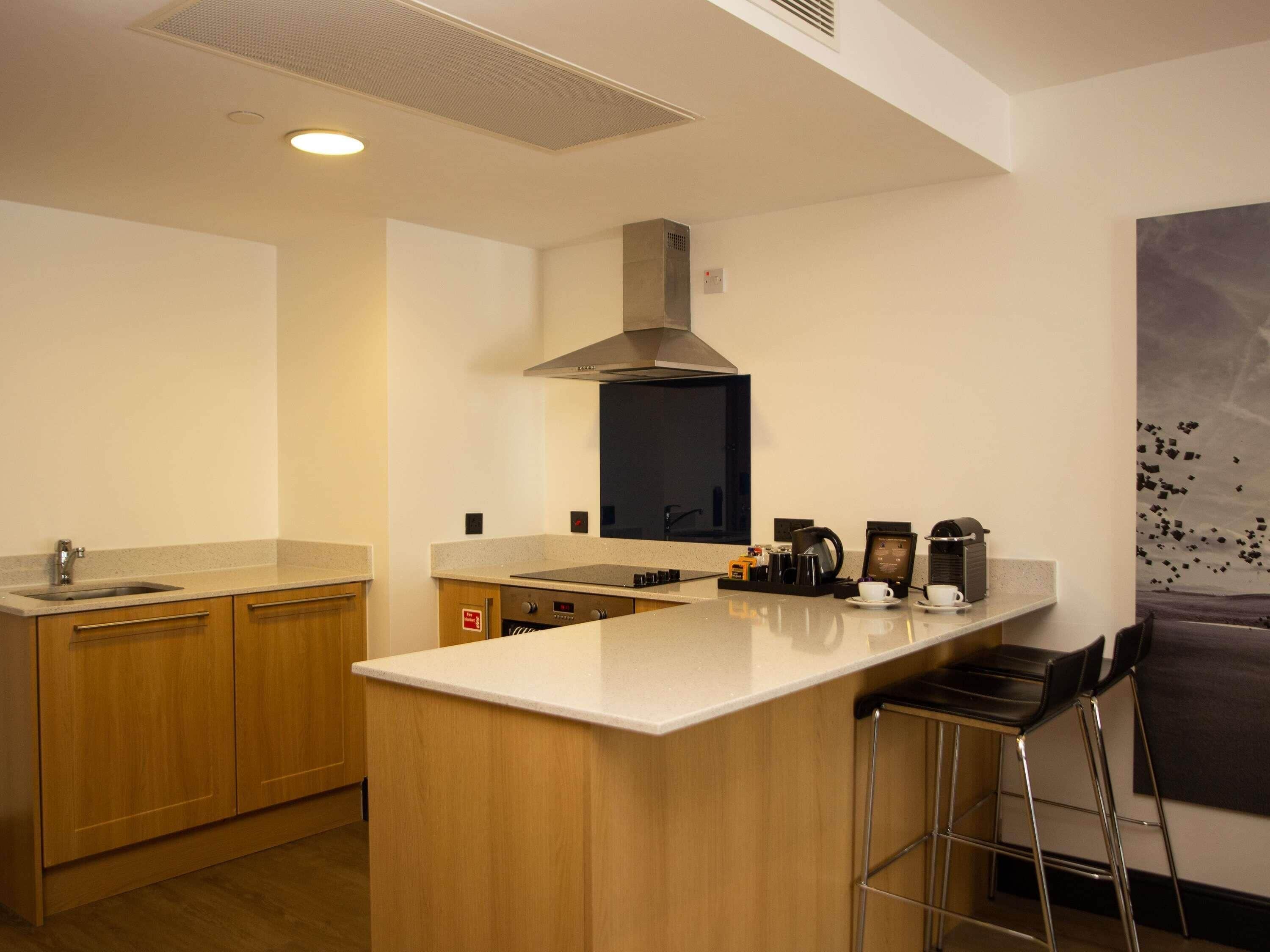 suite, 1 king bed with sofa bed | 1 bedroom, minibar, in-room safe, desk