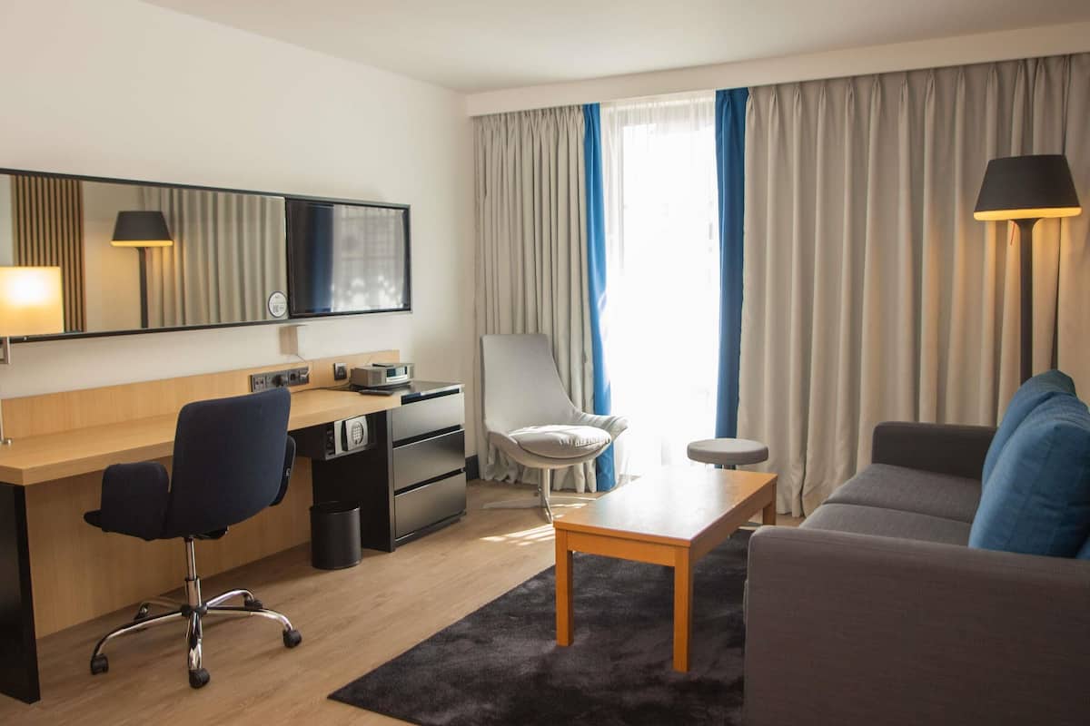 suite, 1 king bed with sofa bed | 1 bedroom, minibar, in-room safe, desk