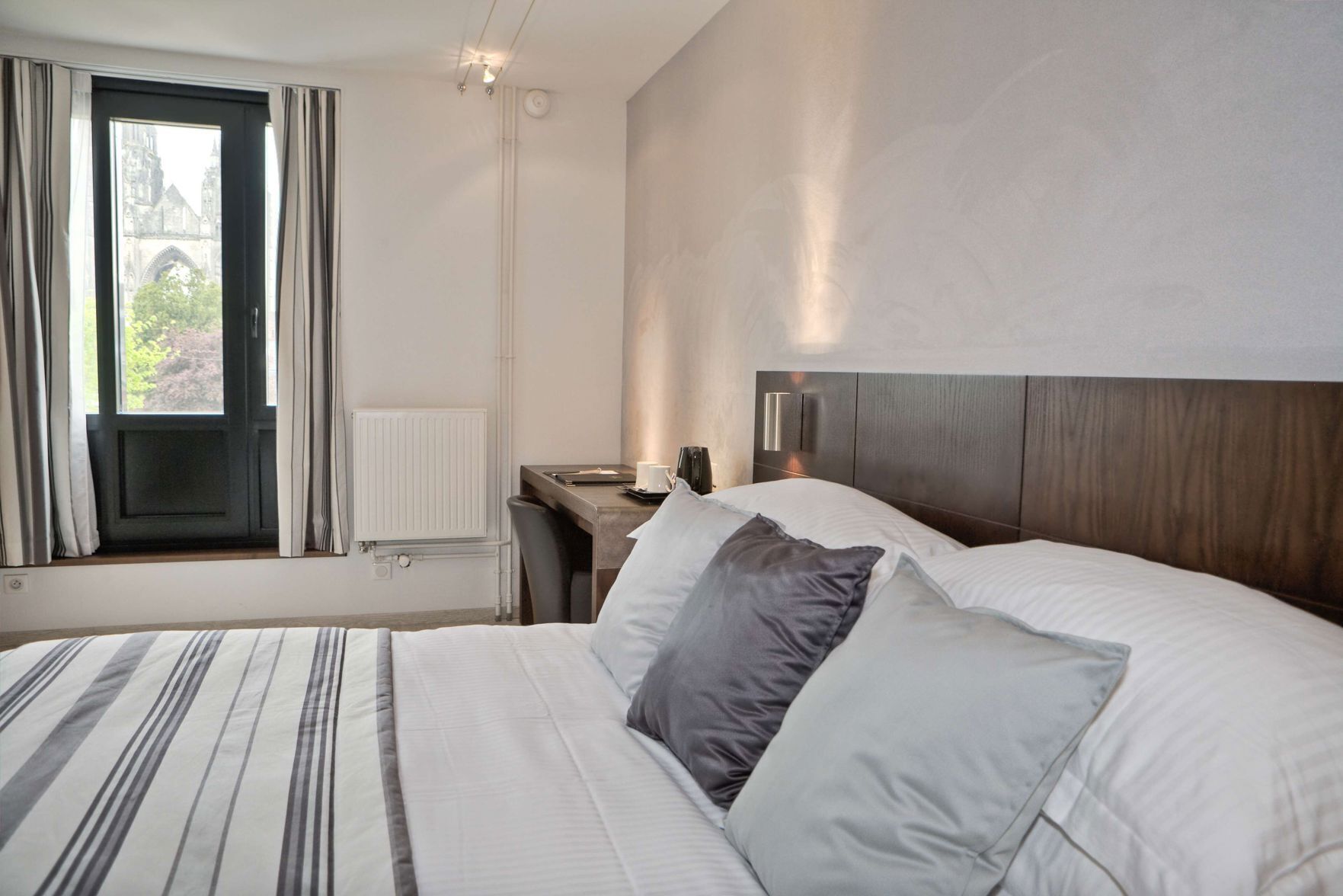 Premium bedding, in-room safe, desk, soundproofing