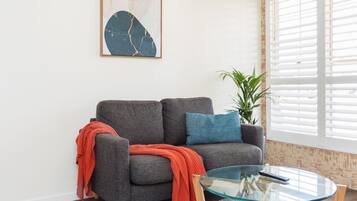 Executive Studio Suite, 1 King Bed | Living area | 42-inch LCD TV with digital channels, TV, Netflix