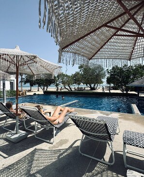 Outdoor pool, pool umbrellas, pool loungers