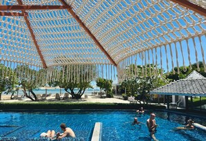 Outdoor pool, pool umbrellas, sun loungers