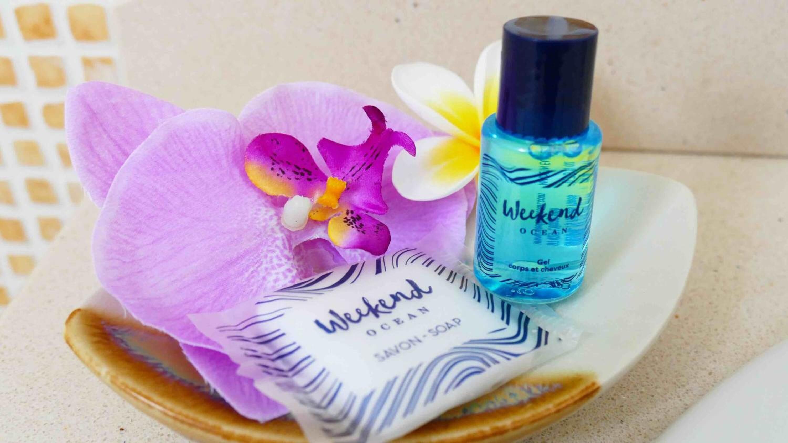 bathtub, free toiletries, hair dryer, towels