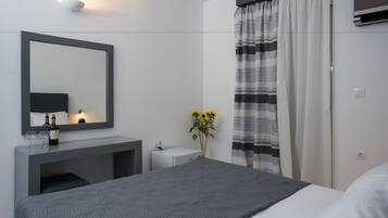 Triple Room | Free minibar items, in-room safe, soundproofing