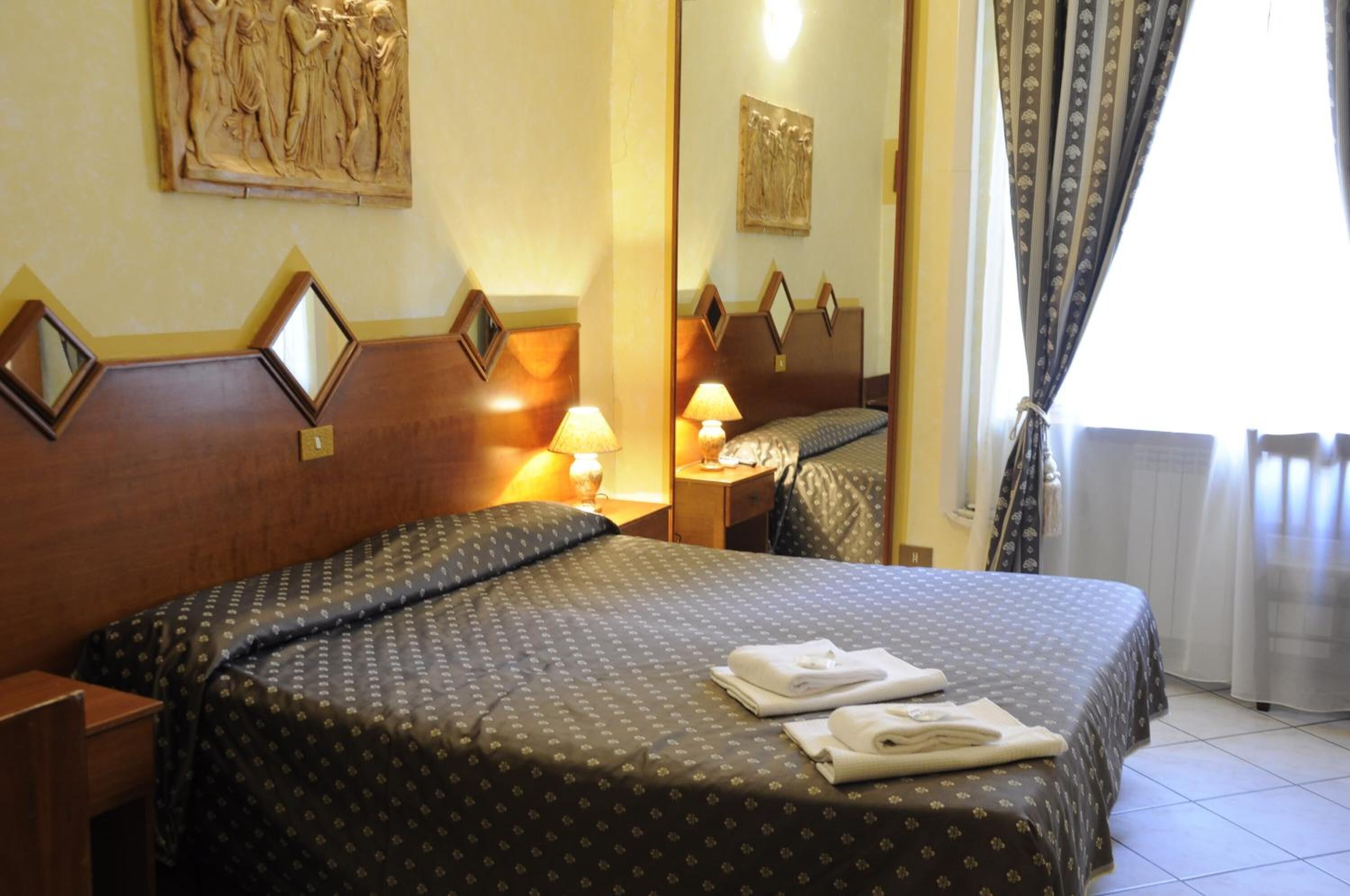 In-room safe, desk, WiFi (free), bed sheets