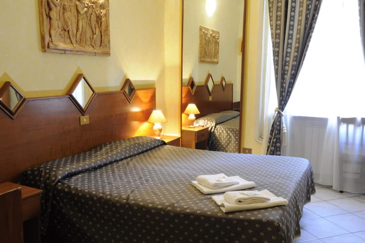 In-room safe, desk, WiFi (free), bed sheets