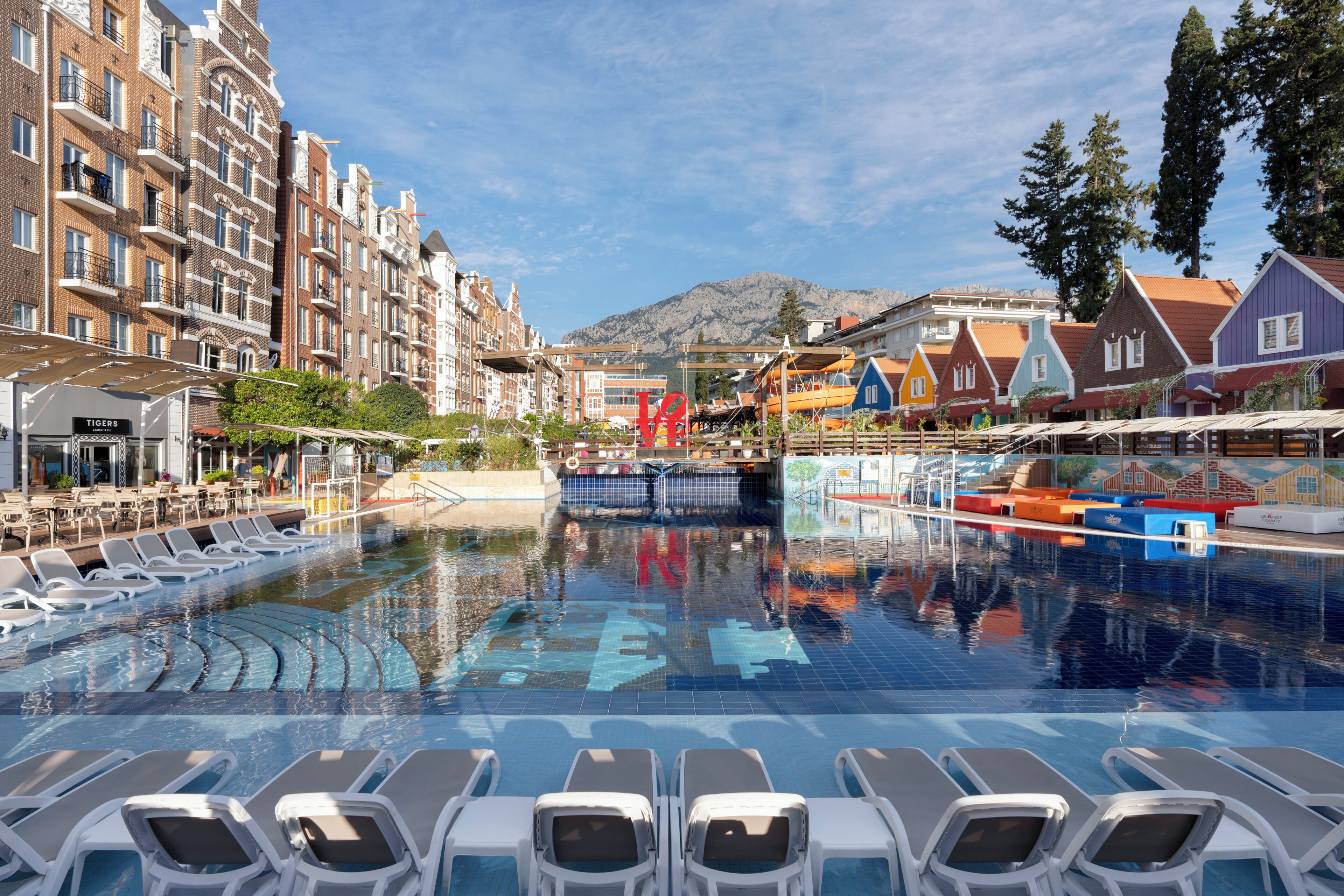 Indoor pool, seasonal outdoor pool, pool umbrellas, sun loungers
