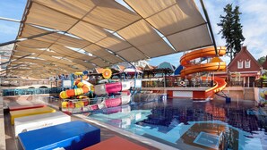 A pool area with slides, sun loungers, and a covered section. - Orange County Kemer (Kemer)