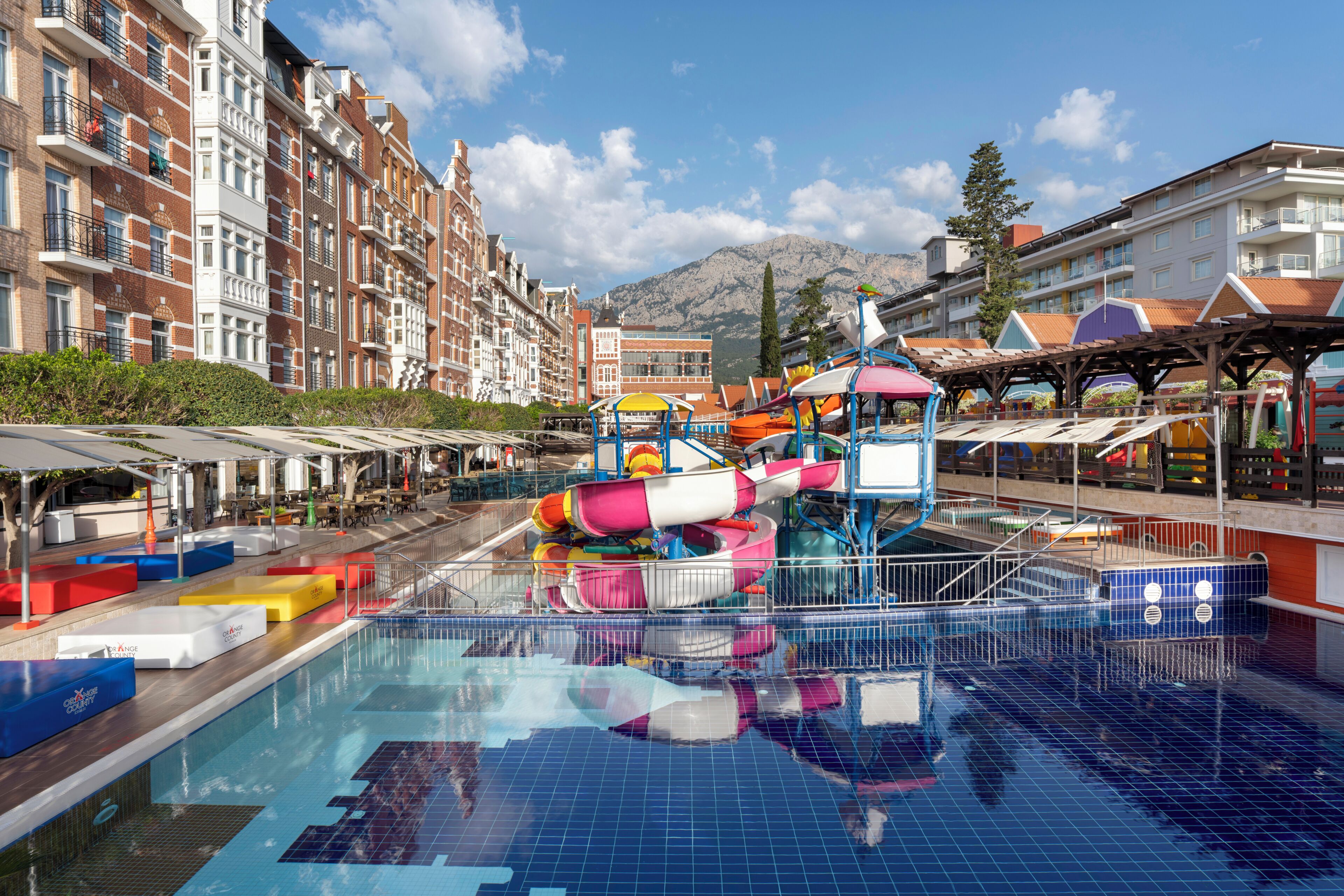 Indoor pool, seasonal outdoor pool, pool umbrellas, sun loungers
