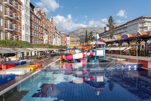 Indoor pool, seasonal outdoor pool, pool umbrellas, sun loungers