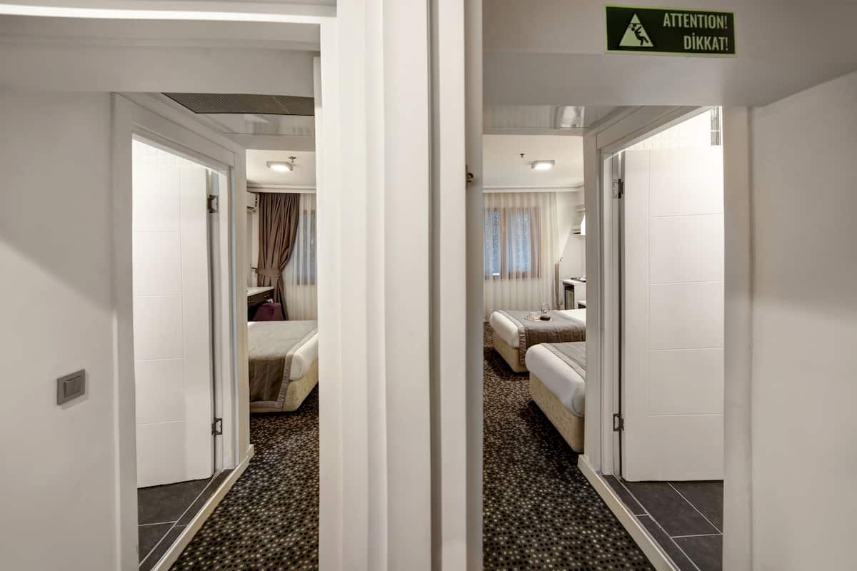 Familie vierpersoonskamer | 1 slaapkamer, luxe beddengoed, een minibar, een kluis op de kamer