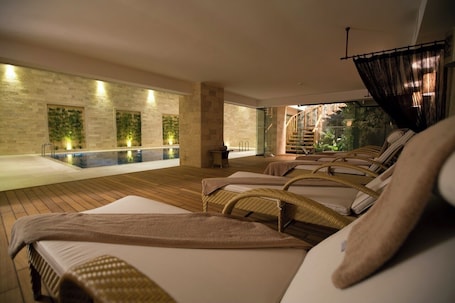 Indoor pool, outdoor pool, pool umbrellas, sun loungers