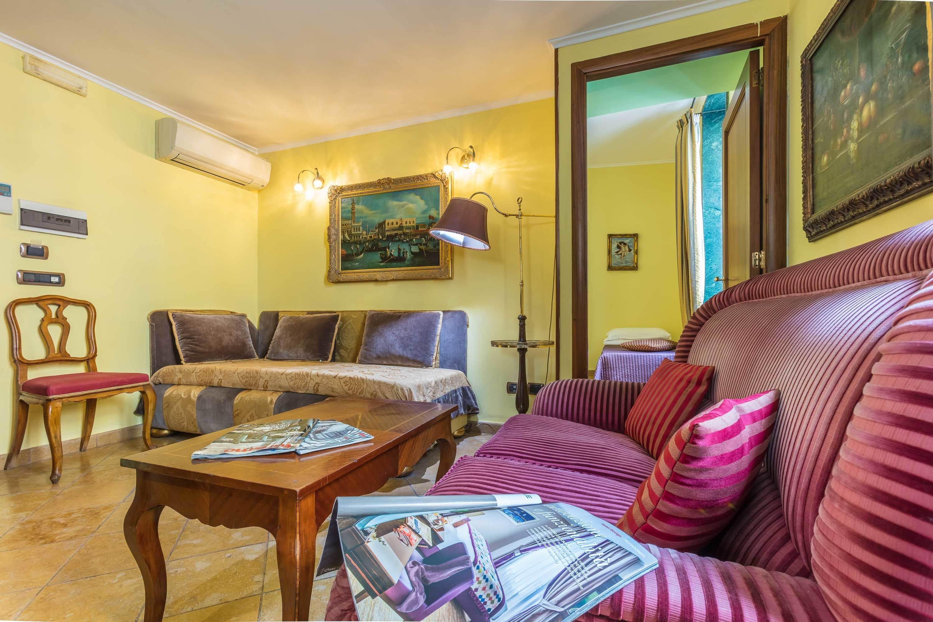 standard quadruple room | minibar, in-room safe, desk, blackout curtains