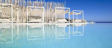 Outdoor pool, pool umbrellas, pool loungers